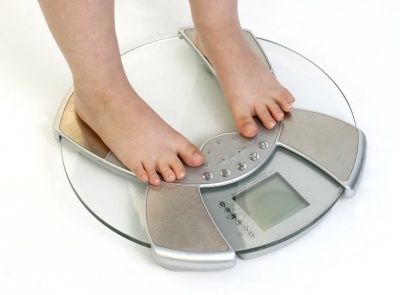 Child standing on scales