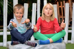 Boy and Girl showing thumbs up