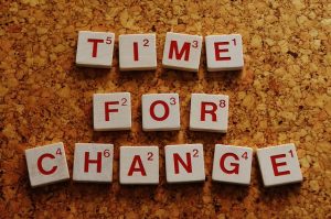 Time for Change written in Scrabble tiles