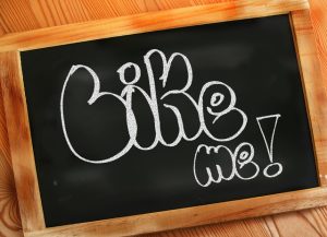 Words 'Like Me' on blackboard