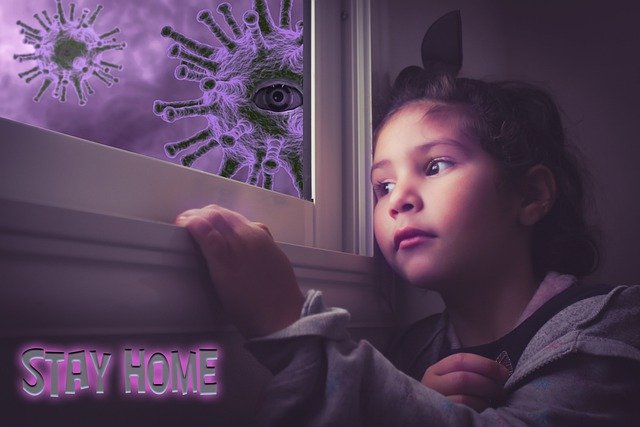 Young girl in Isolation - Virus cells outside window