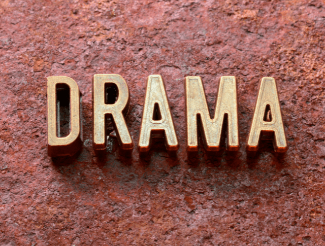 the word drama spelled out with metallic letters