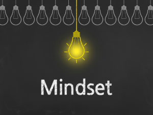 blackboard with lightbulbs and the word mindset