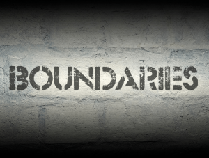 'Boundaries' written on brick wall